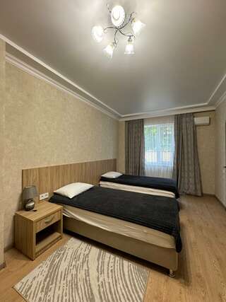 Гостиница Рай Краснодар Бюджетный двухместный номер с 2 отдельными кроватями-4